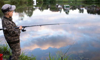 Wall Mural - little boy on the fishing