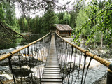 Fototapeta Dziecięca - Look at the hanging bridge over the mountain river