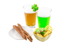 Thin Meat Sausages Spicy Spicy Set Of Chips And Two Glasses Of Beer Lager And Green With High White Foam And Clover Cookies On A White Background Day Saint Patric