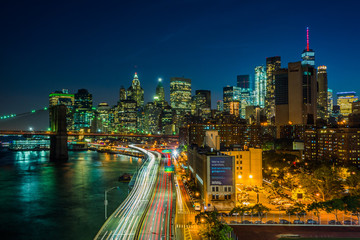 View of FDR Drive and the Lower Manhattan skyline at night, from the Manhattan Bridge Walkway, New York.