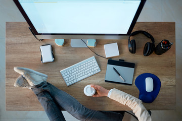 top view of business working desk - Graphic designer take a coffee break .