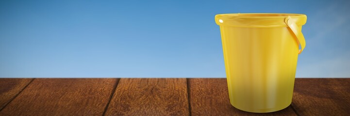 Poster - Composite image of new yellow bucket