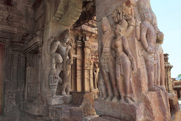 Carved figures dvarapala and charming mithunas on the pillars of northern mukha mandapa, Virupaksha temple, Pattadakal temple complex, Pattadakal, Karnataka, India