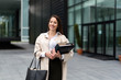 © NDABCREATIVITY - Portrait of young businesswoman going to office