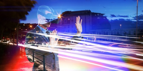 Poster - Composite image of businessman using virtual reality headset