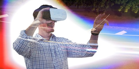 Poster - Composite image of businessman working with vr
