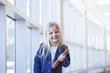 © Olesya Shelomova - Portrait of lovely little girl standing in office building