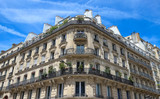 The traditional facade of Parisian building, France.
