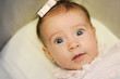 © javiindy - Little baby girl with surprise expression on her face