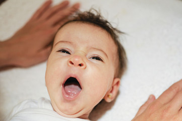 Wall Mural - Baby girl two months old yawning