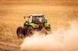 © Daniel - Mulching tractor after rapeseed harvest among the dust