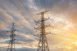 © aedkafl - high voltage post,High voltage tower sky sunset background