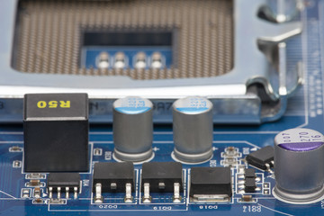 Electronic board. Shallow depth of field. In the blurred background, you can see the processor socket (CPU). Can be used as a background