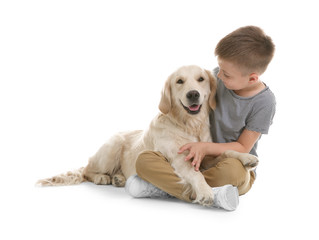 Cute little child with his pet on white background