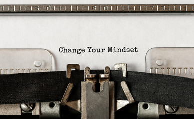 Poster - text change your mindset typed on retro typewriter