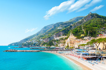 Morning view of Amalfi cityscape on coast line of mediterranean sea, Italy