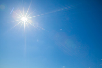 shining sun at clear blue sky
