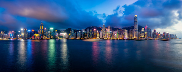 Fototapete - Panorama of Hong Kong City skyline at night. View from across Victoria Harbor Hongkong.
