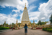Young Woman Traveler Traveling Into Wat Phra That Nong Bua Is A Dhammyuttika Temple, One Of Important Temples In Ubon Ratchathani Thailand.
