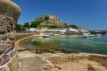 Gorey Castle, Jersey, U.K. July 8th 2018,
The Medieval 12th Century Landmark And Harbor In The Summer, Sir Walter Raliegh's Address When He Governed The Island In The Turn Of The 17th Century.