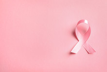Pink Ribbon On Color Background, Top View. Cancer Awareness