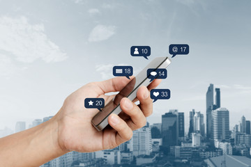 Poster - Hand holding mobile smart phone, with social media and social network notification icon