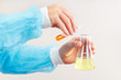 Chemist hands is conducting chemical experiments in the laboratory
