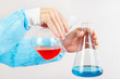 Researcher hands is conducting chemical experiments in the laboratory