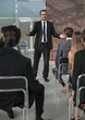© ASDF - speaker makes a report at the business seminar.