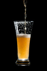 craft beer glass on black background