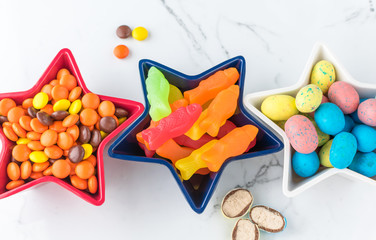 Colorful bright crunchy chocolate and gummy fish candies