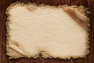 Wall Mural - old paper on brown wood texture with natural patterns