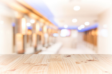 top wood table with Blur Background