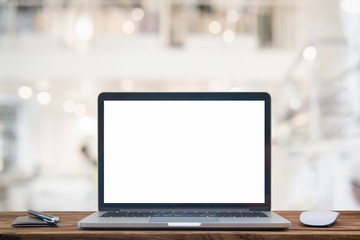 computer notebook and mouse with a coffee shop