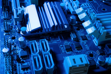 Poster - Electronic circuits in futuristic technology concept. Motherboard computer on blue background. Microchip digital data