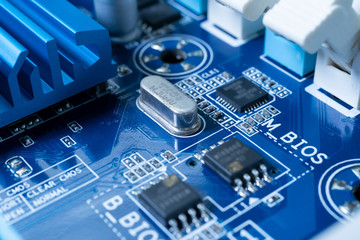 Poster - Electronic circuits in futuristic technology concept. Motherboard computer on blue background. Microchip digital data