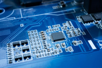 Poster - Electronic circuits in futuristic technology concept. Motherboard computer on blue background. Microchip digital data