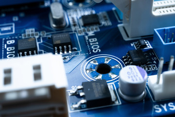 Poster - Electronic circuits in futuristic technology concept. Motherboard computer on blue background. Microchip digital data