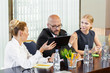 © fotofabrika - Business people working together at conference table