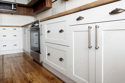 Stylish Light Gray Handles On Cabinets Close Up Kitchen