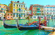 The Grand Canal in Venice with moored gondolas