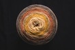 © Wavebreak Media - Colorful yarn isolated against black background