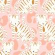 Vector seamless pattern with cute tigers on a pink jaguar spot background