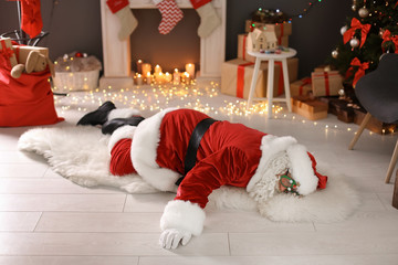 Canvas Print - Authentic Santa Claus lying on floor indoors