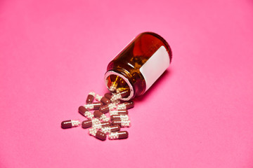 Wall Mural - Pills with bottle on pink