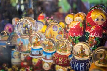 Wall Mural - Moscow, Russia - 07 09 2018: a stall selling traditional Russian gifts, nesting dolls, spoons, glass bowls in a shop window