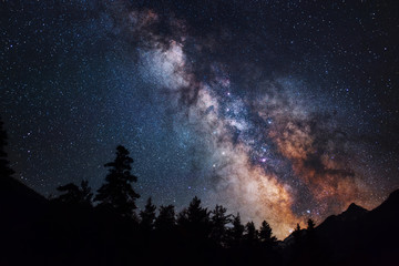 astrophotography of milky way galaxy. silhouette of mountains. stars, nebula and stardust at night s