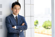 © taka - portrait of asian businessman relaxing
