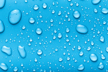 Drops Of Water On A Color Background. Blue. Toned