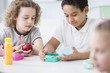 © Photographee.eu - African-american boy and his friend eating apple and during break at school
